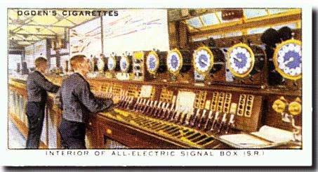 London Bridge signal box internior taken in 1950's, with its Westinghouse Brake and Signal Co. Ltd miniature power lever frame, notice the Walker Rotary Train describer, cigarette card 1