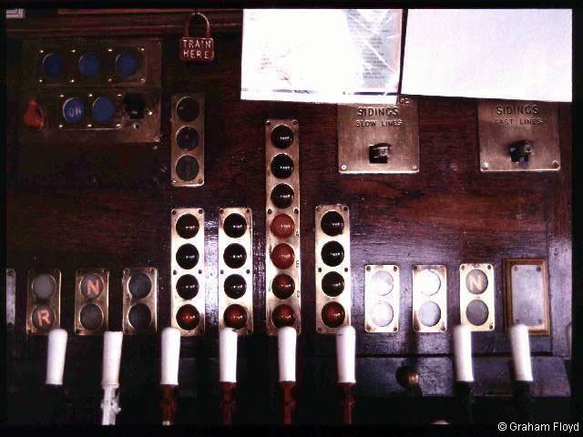 Victoria West Junction [Manchester] signal box taken around 1990, with its Westinghouse Brake and Signal Co. Ltd style 'K' miniature power lever frame photograph 3 - closeup of block instruments.