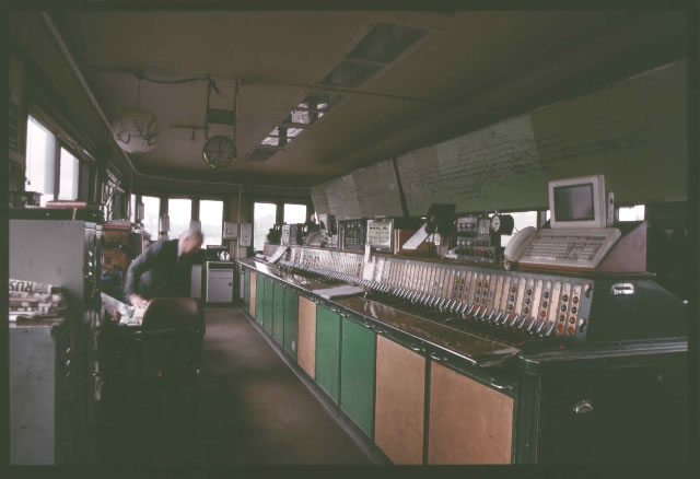 Woking signal box general interior view taken 1990's, with its Westinghouse Brake and Signal Co. Ltd miniature power lever frame, taken from London end of frame.